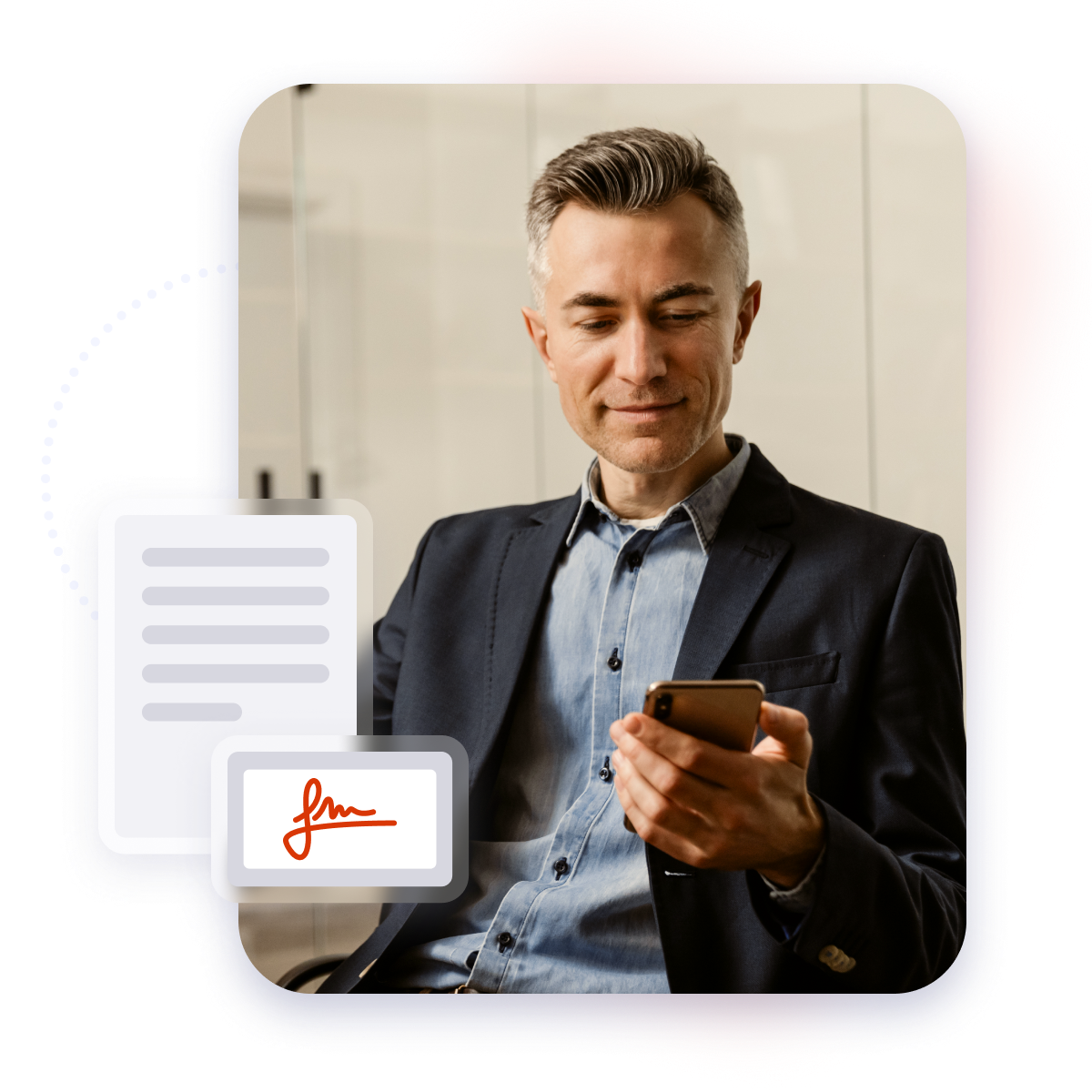 Mature and confident business man looking at his mobile phone